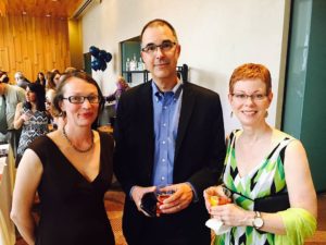 Flanked at the reception by KPLU's Ashley Gross and first reader Dee Dee Catalano.